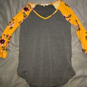 size small gray shirt with yellow flower sleeves